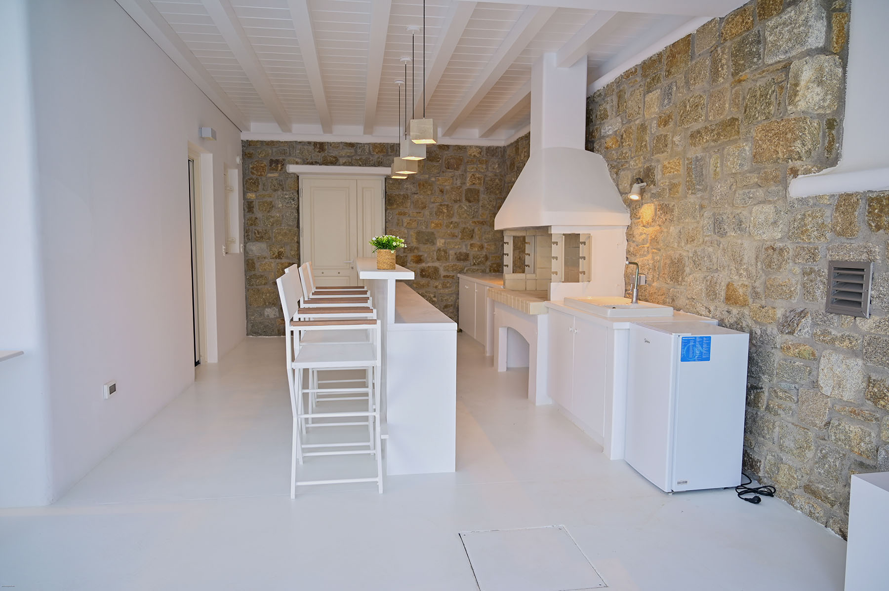 Villa kitchen with stone architecture